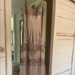 Gorgeous sleek full length dress. Beads and sequins